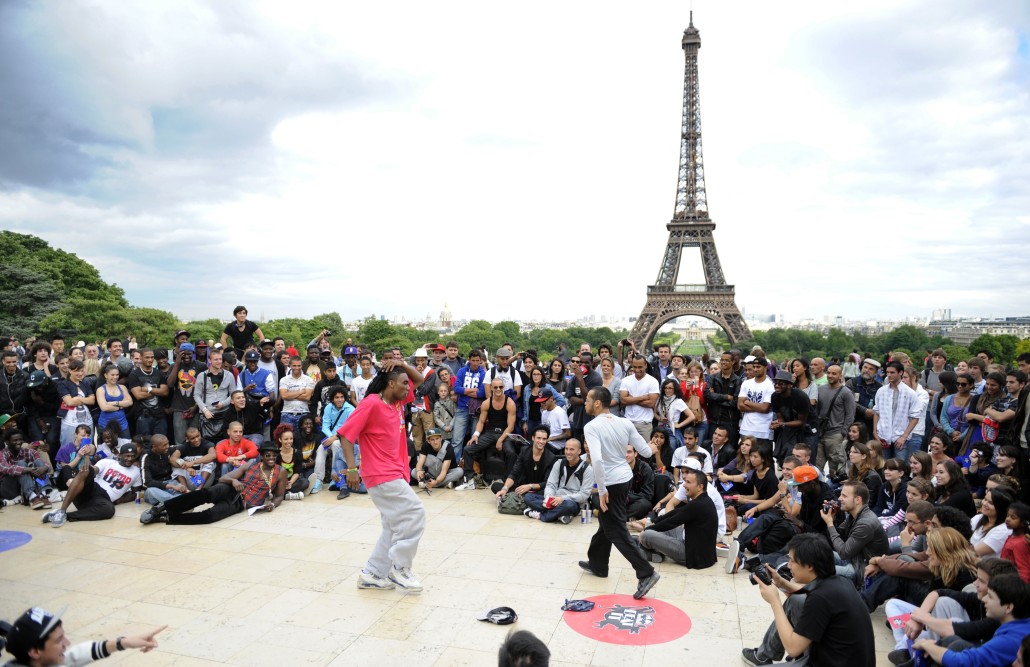 Street dancers perform on June 21, 2011 in front of the Eiffel tower in Paris, as part of the 30th annual music event, 